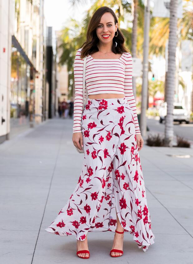 mixed prints trend by pairing a floral maxi skirt with a striped top