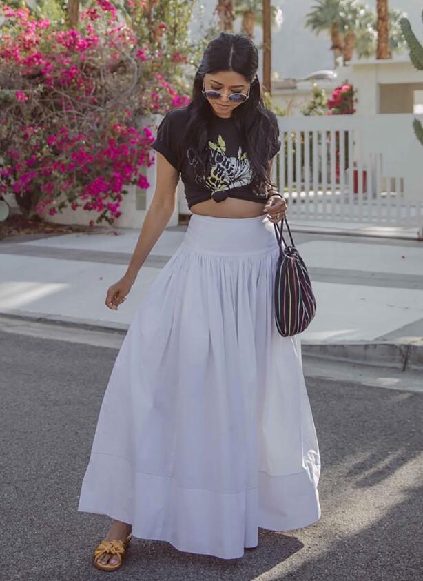 Bring some edge to a maxi skirt with a graphic tee like Walk in Wonderland.