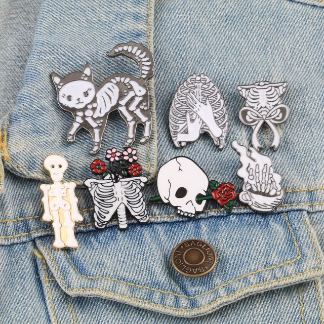 https://i0.wp.com/ae01.alicdn.com/kf/H43a90e4a661e40d598afadcf733737a9J/Skeleton-Enamel-Pin-Skull-Cat-Rib-Rose-Flowers-Badge-Brooch-Denim-Jackets-Lapel-Pin-Gothic-Punk.jpg?crop=4,2,954,616&quality=3595